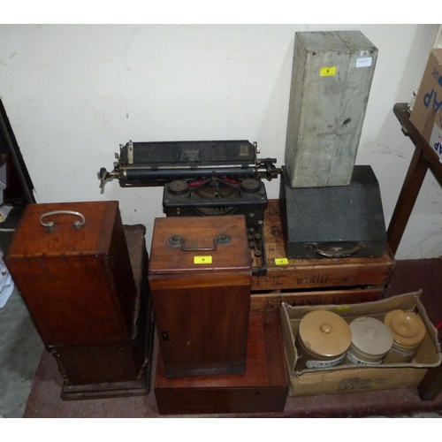 8 - A wooden crate, various boxes, stoneware, two typewriters  and a sewing machine