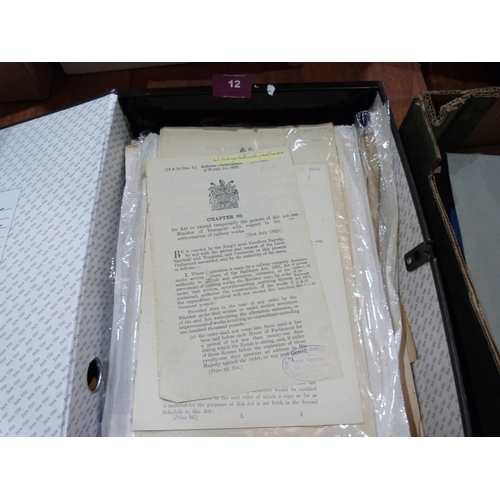 12 - A folder of Acts of Parliament