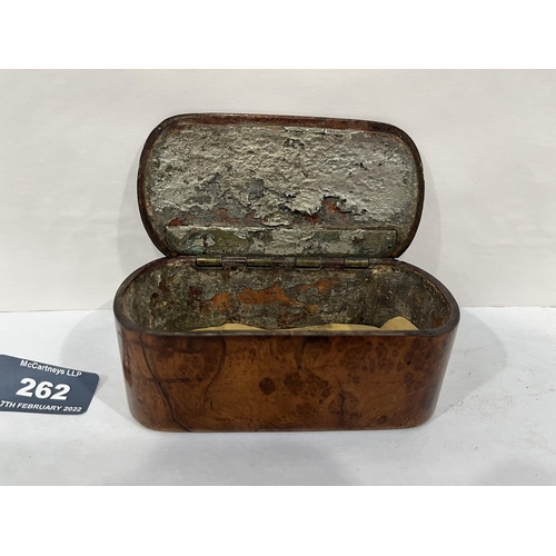 262 - A 19th century burrwod tea or snuffbox with lined interior. 5' wide