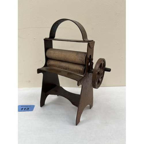 113 - A Victorian toy mangle. 7¼' high