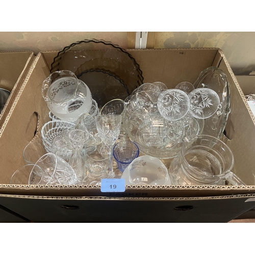 19 - A box of stainless steel cookware and a box of glassware