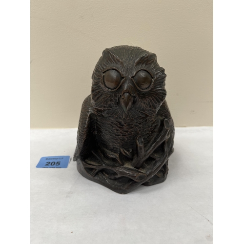 205 - A bronzed metal and resinous model of an owl, the base rim signed Richard Fisher. 5¼' high