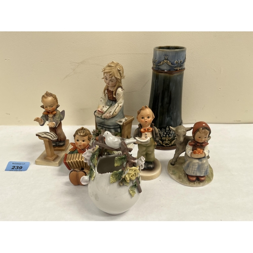 239 - Four Hummel figures; another figure; a Royal Doulton vase and a porcelain basket