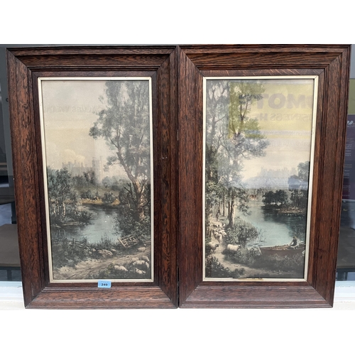 249 - A pair of oak framed prints, castles in landscapes. 23' x 12'