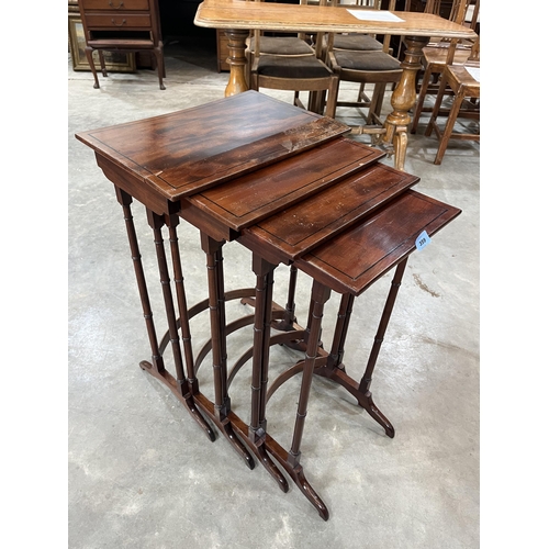 359 - A nest of mahogany quartetto tables with line inlaid tops on faux bamboo spider legs. (Two tables wi... 