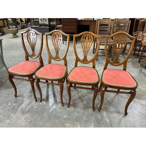 360 - A set of four Thonet shield-back dining chairs