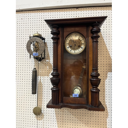 368 - A walnut Vienna style wall clock and a skeleton wall timepiece