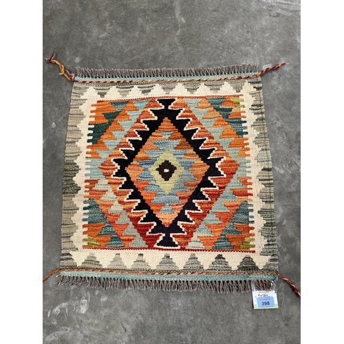 398 - A Choli Kilim rug. 0.5m x 0.5m