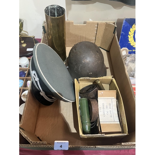 4 - A box of militaria to include a facsimile German jacket and cap