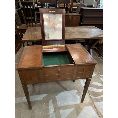 446 - An inlaid mahogany lady's dressing table of recent manufacture. 30½' wide