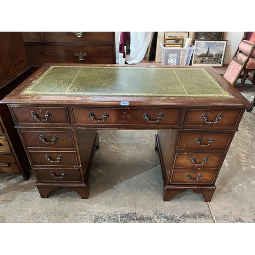 449 - A mahogany pedestal desk with inlet leather top. Of recent manufacture. 48' wide