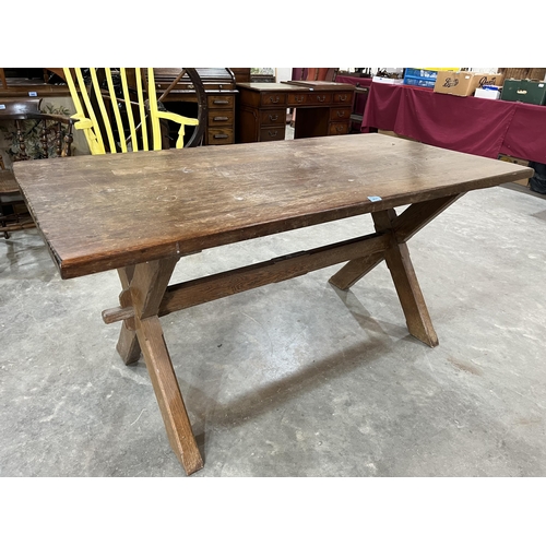 451 - An oak refectory style table on cruciform supports, 62' long, the lot to include a set of four oak l... 