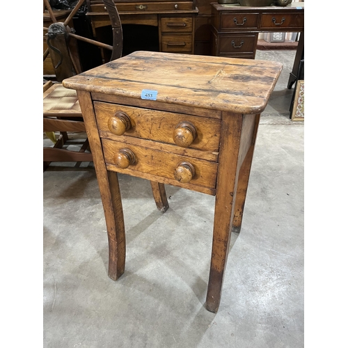 453 - A 19th century fruitwood book press stand fitted with two drawers