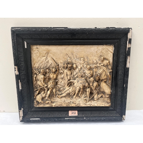 212 - A 19th century continental composition plaque, battle scene in high relief. 10' x 13'