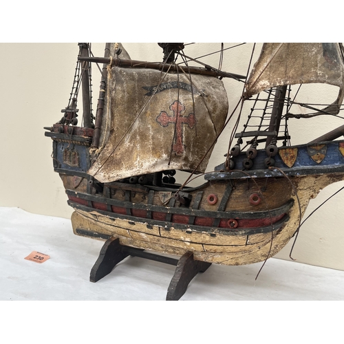 230 - A wooden model of the galleon Santa Maria. 22' high