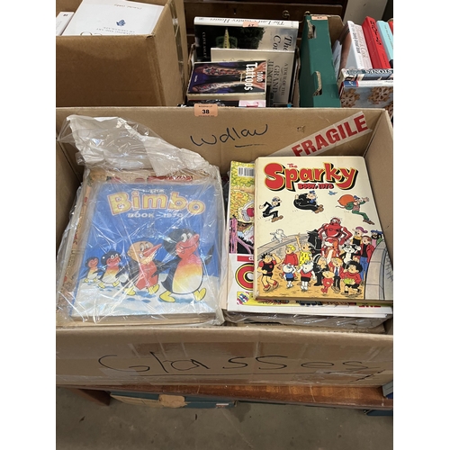 38 - Two boxes of comics and annuals