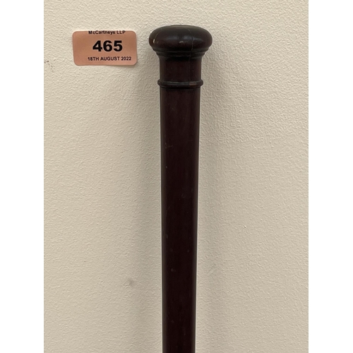 465 - A 19th century mahogany staff. 51' long