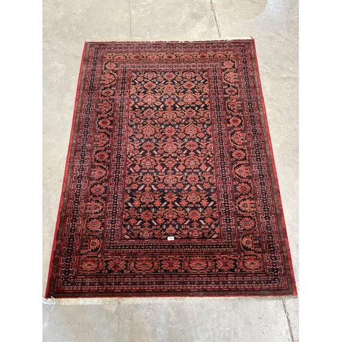 494 - An eastern carpet. 75' x 54'