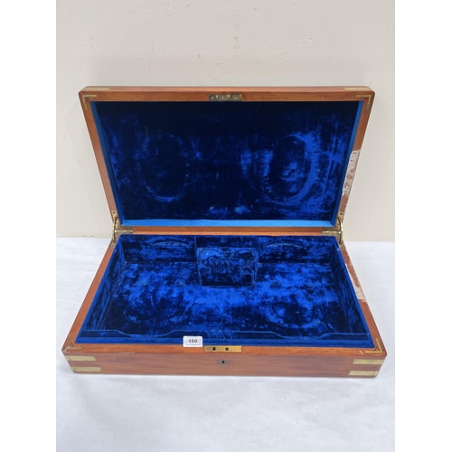 160 - A Victorian mahogany and brass mounted box with velvet lined interior. 25' wide