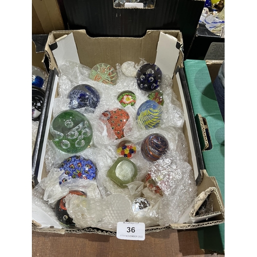 36 - Two boxes of glass paperweights