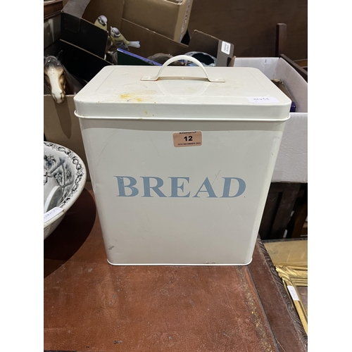 12 - An enamel bread bin and cover. 12' high