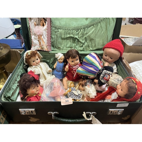 38 - A case of vintage dolls