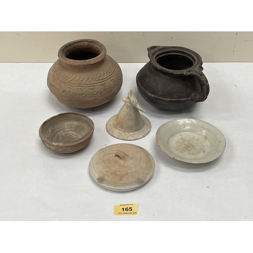 165 - A collection of ancient pottery from Mesopotania, Africa, China and other origins. The lot to includ... 