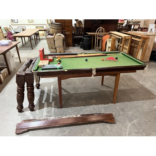 398 - A quarter size E.J. Riley mahogany snooker table with slate bed on turned legs. To include a selecti... 