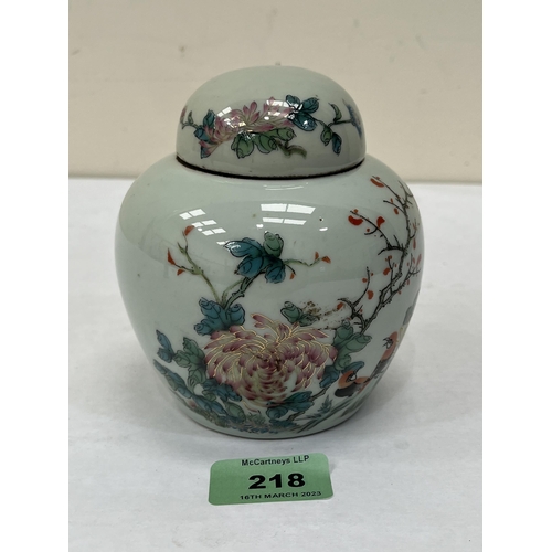 218 - A 20th century Chinese jar and cover, painted with chrysanthemums, birds on prunus. 4¾' high