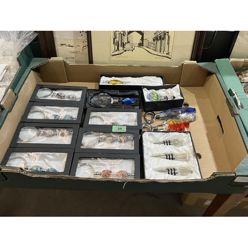 25 - Two boxes of letter openers and glass scent bottles