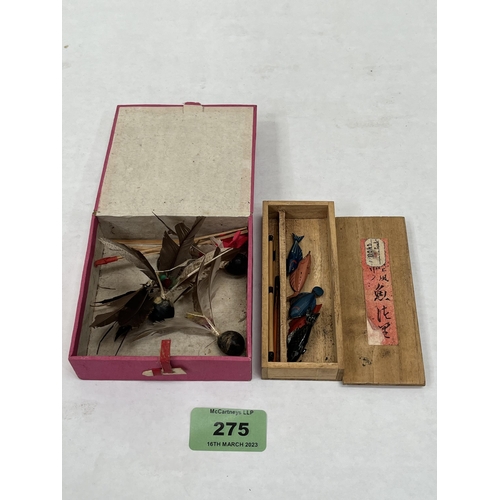 275 - A vintage Chinese shuttlecock game and a Chinese fishing try