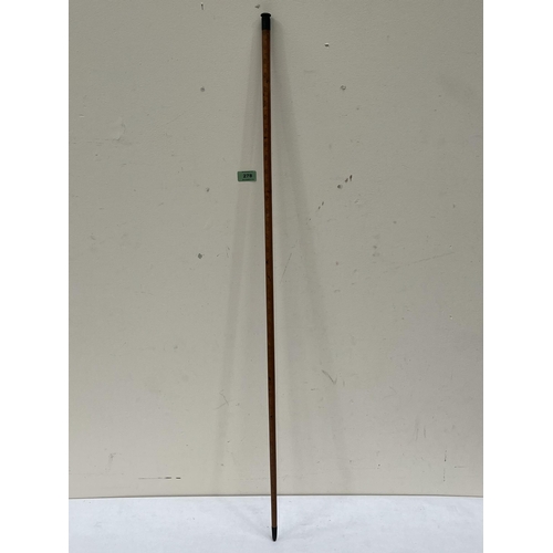 278 - A walking cane or dipper with measuring scale to the shaft. 42' long