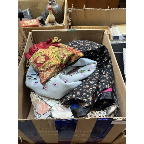 32 - Two boxes of patchwork and other textiles