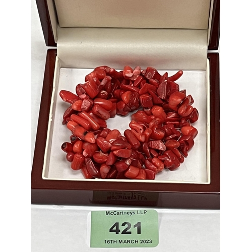 421 - A red coral multi-strand bracelet 85.9g