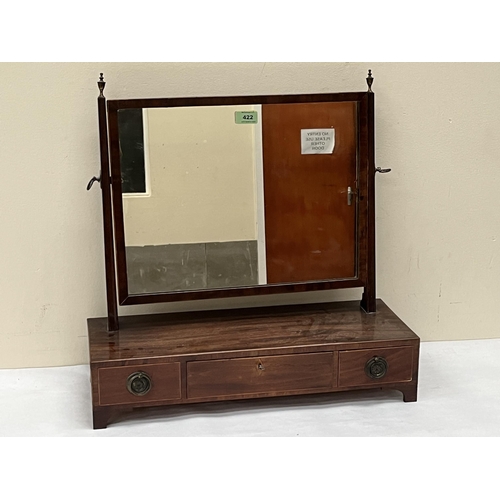 422 - A George IV mahogany dressing mirror, the base with three drawers. 22' wide