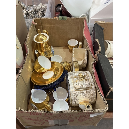 58 - Four boxes of teaware