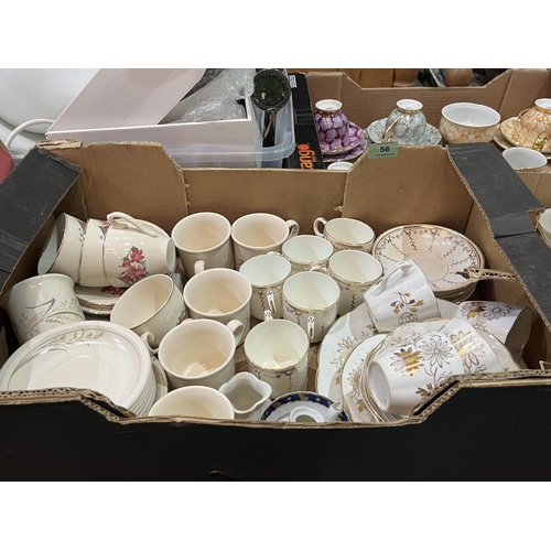 58 - Four boxes of teaware