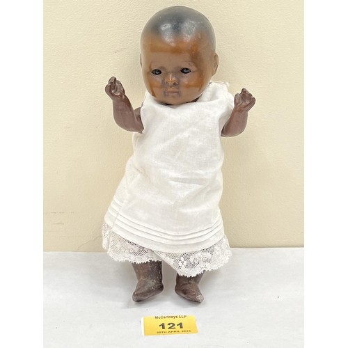 121 - A German composition baby doll with sleeping eyes and articulated limbs. 9' high. Heubach or a subsi... 