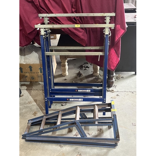 282 - A pair of axle stands and a pair of folding metal stands