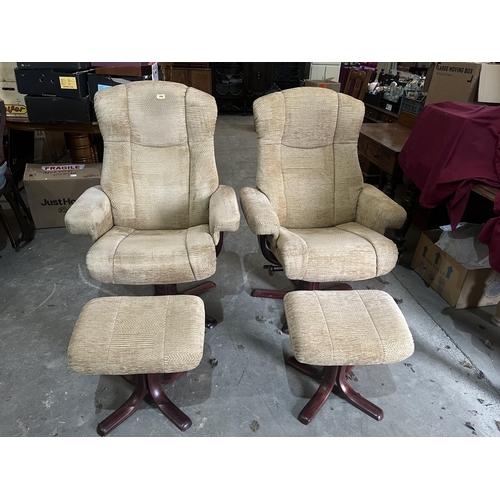 290 - A pair of upholstered armchairs with a pair of footstools