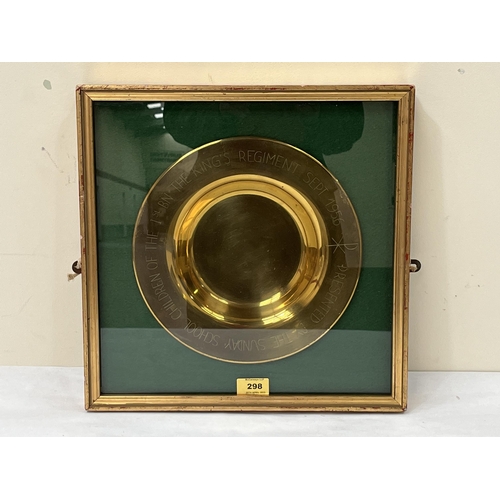 298 - A framed brass ceremonial dish, presented by the Sunday School children of the 1st Bn. The King's Re... 