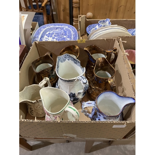 67 - Two boxes of 19th century copper lustre and other jugs