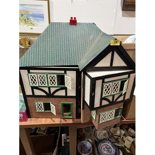 78 - A mock Tudor doll's house. 24' wide