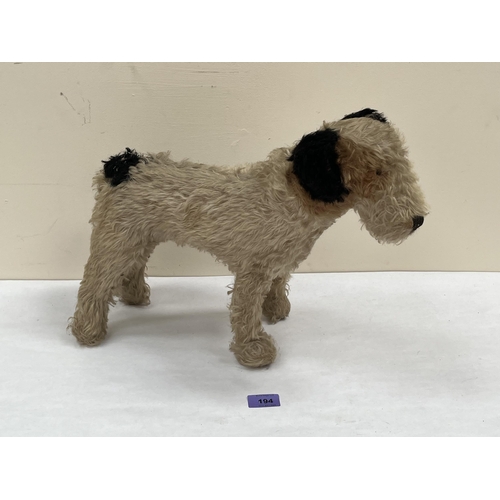 194 - A 1930s plush stuffed fox terrier. 17' long