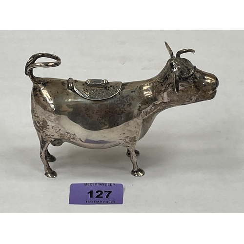 127 - A silver cow creamer. Marks rubbed. 5¼' long. 5ozs 6dwts