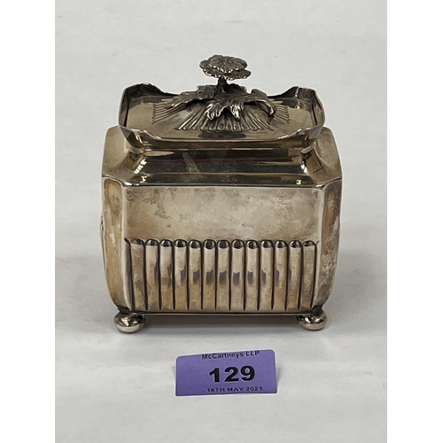 129 - A Victorian silver half-gadrooned tea caddy with foliate finial on bun feet. Sheffield 1889. 3½' wid... 