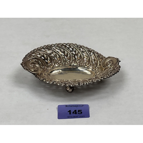 145 - An Edward VII silver pierced and repousse oviform dish. Birmingham 1904. 5¼' wide. 1ozs 5dwts