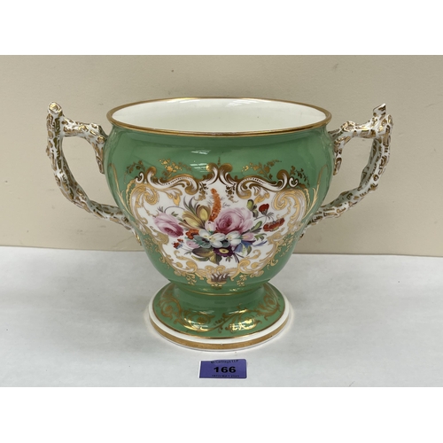 166 - A 19th century two handled vase in Sevres style, painted in two reserves with summer flowers or hort... 