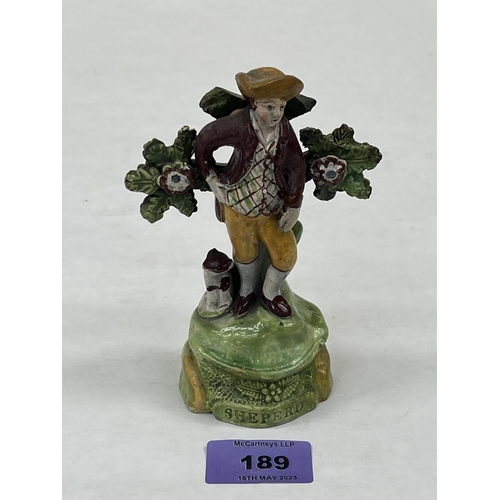 189 - An early 19th century Staffordshire bocage figure of a sheperd (sic) 5¼' high.