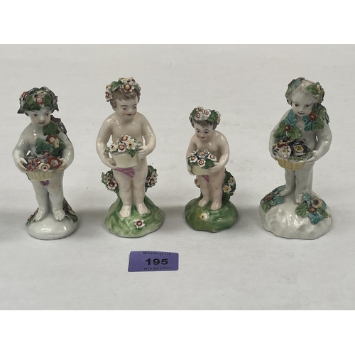 195 - Four 19th century glazed earthenware figures of children with baskets of flowers. 5' high and smalle... 